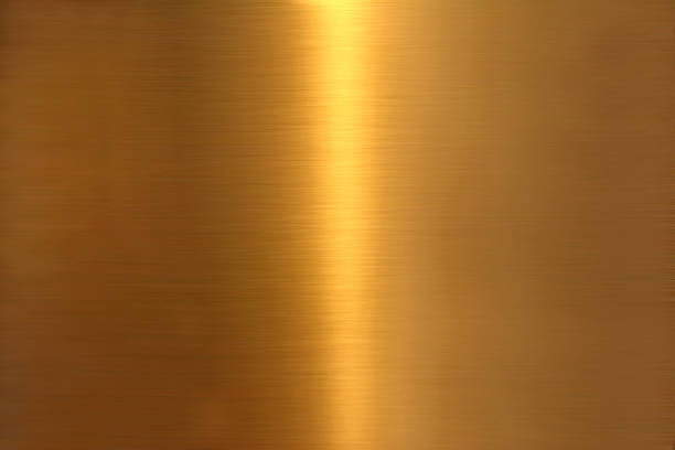 istock background image of golden colored brushed metal surface texture 1154701710