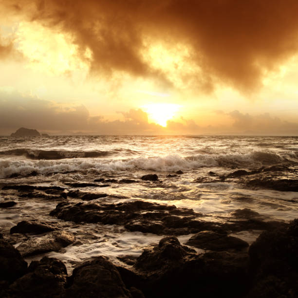 seascape and waves over cloudy sunset sky in Phuket island, Thailand