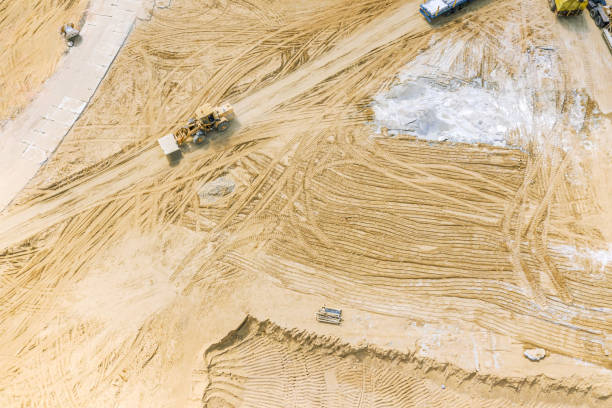 istock wheel loader on road construction works. aerial photography 1154714849