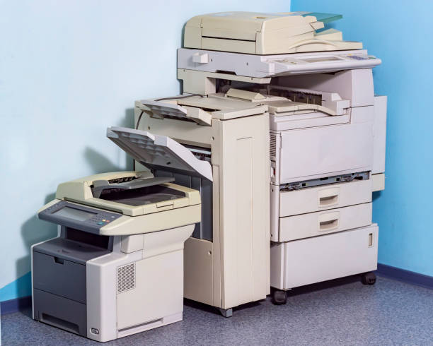 istock Old broken office equipment stands on the floor in the corner. 1154714979