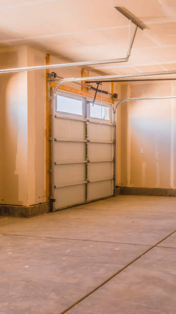 istock Vertical tall frame Interior of a garage under construction with unfinished walls 1154715084
