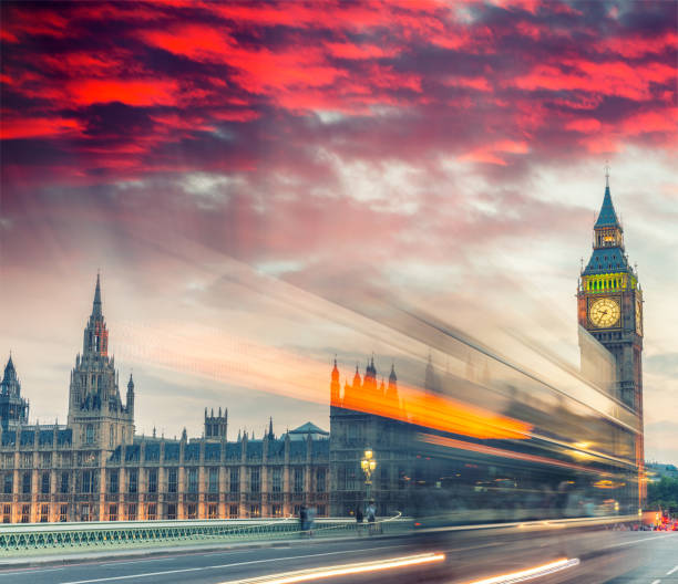 istock Westminster Bridge with car light trails at night, London 1154717371