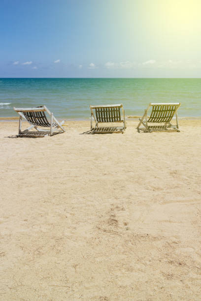 Painting landscape, Beautiful beach. Chairs on the sandy beach near the sea. Summer holiday and vacation concept