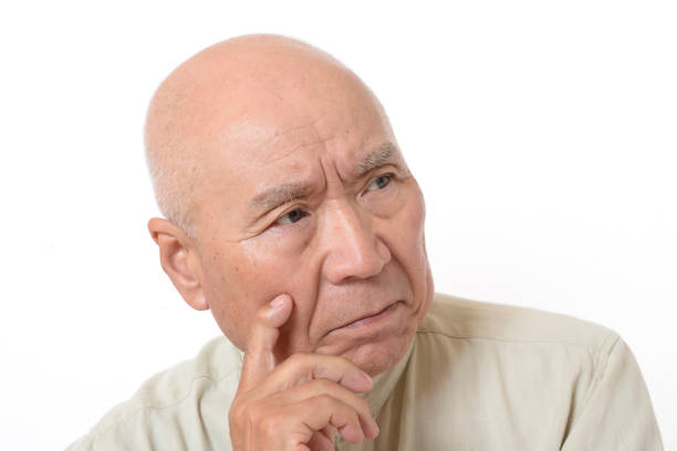 istock Japanese senior with troubled face 1154720651