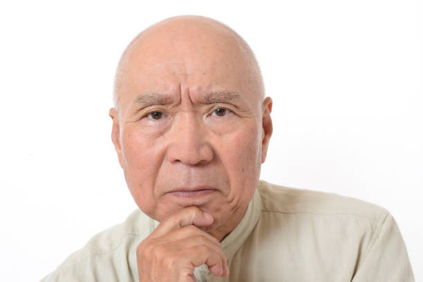 istock Japanese senior with troubled face 1154720653