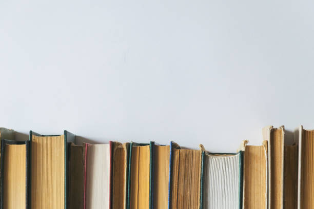 istock old books on a bookshelf with white background 1154728355