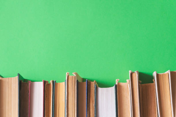 istock old books on bookshelves with green background 1154728361