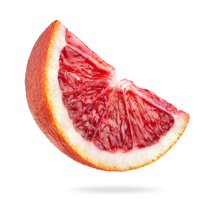 single slice of sicilian blood orange fruit isolated on white background