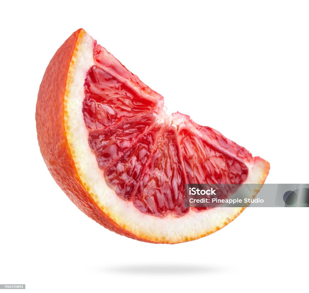 blood orange slice single slice of sicilian blood orange fruit isolated on white background Blood Orange Stock Photo