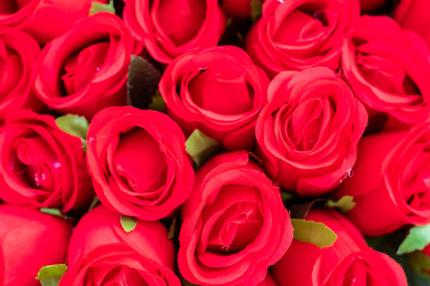 istock red rose flowers. made from fabric 1154733066