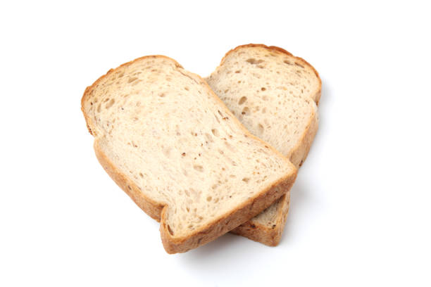 istock toasted slices of Bread with walnuts isolated on white background 1154735615