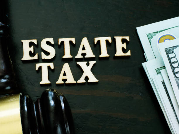 Estate tax from wooden letters and gavel. Estate tax from wooden letters and gavel. mansion stock pictures, royalty-free photos & images