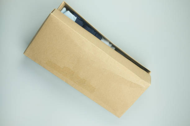 istock Recycled parcel address delivery box. Brown postal carton paper 1154738481