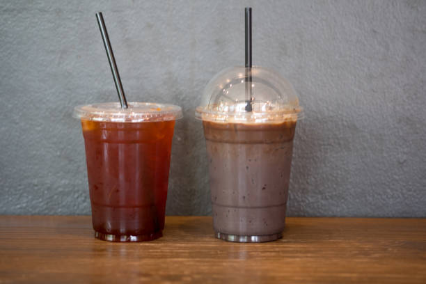 istock Cup of take away iced coffee plastic cup. Cold chocolate and iced americano 1154738559