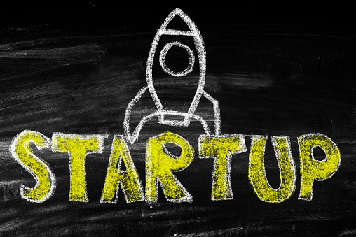 Launching,startup concept on blackboard