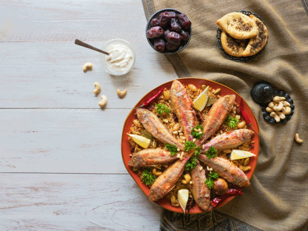 istock Fish Kabsa, mixed rice dishes. Middle eastern food 1154742433