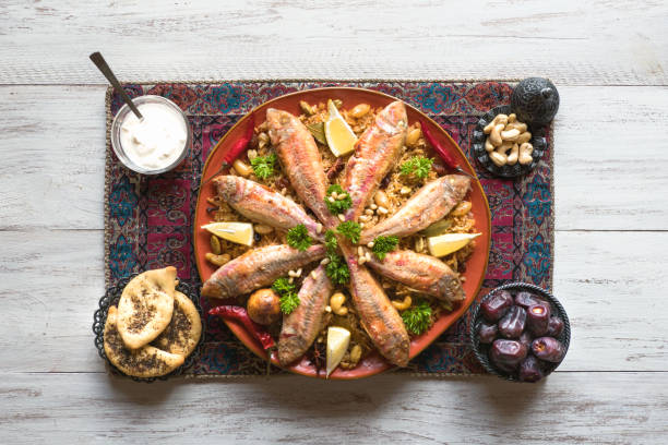 istock Fish Kabsa, mixed rice dishes. Middle eastern food 1154742506