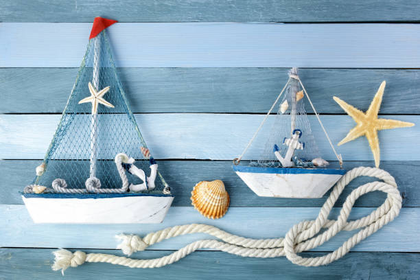 istock Few summer marine items on a wooden background. 1154748177
