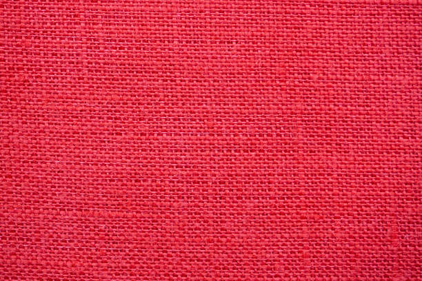 istock Red color linen canvas texture background 1154751350