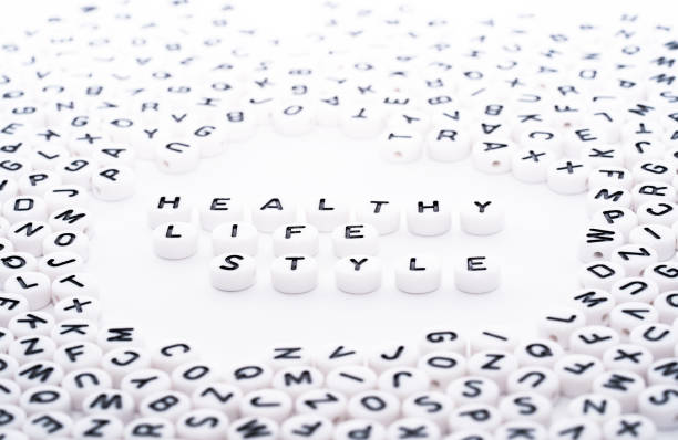 istock Healthy Life style text written with white blocks dice with black text top down view 1154755514