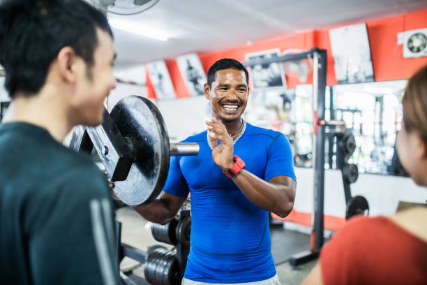 istock Personal trainer having conversation at the gym. 1154757489