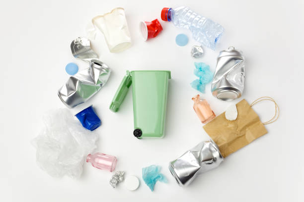 istock sorting of garbage types. Waste management concept. Top view 1154758714