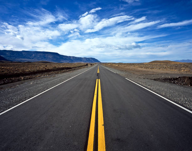 Straight road disappearing into the distance near El Chalten in Patagonia, Argentina