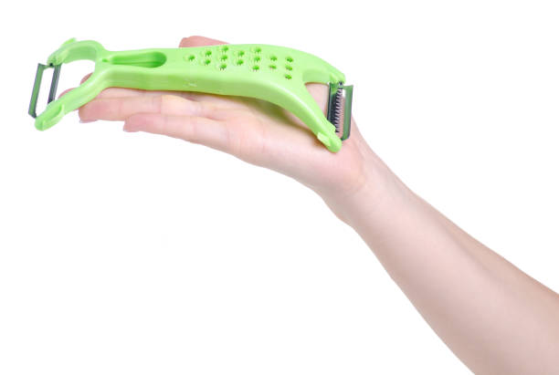 istock Peeler for vegetables in hand 1154763787