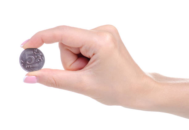 istock Penny coins in hand 1154763817