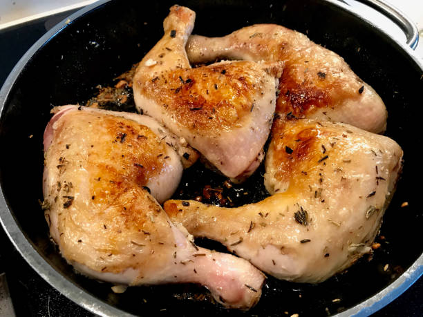 istock Chicken Legs are Frying in Pan. 1154767591