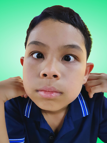 Funny Boy Making Silly Face Isolated On Green Background Stock Photo -  Download Image Now - iStock