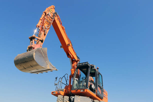 istock Excavation work with excavator on a building site 1154772326