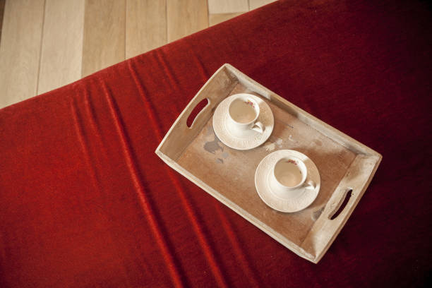 two antique cups of coffee on the old tray, copy space