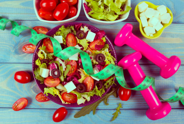 istock Fresh vegetable salad with feta cheese. Proper nutrition. 1154774931