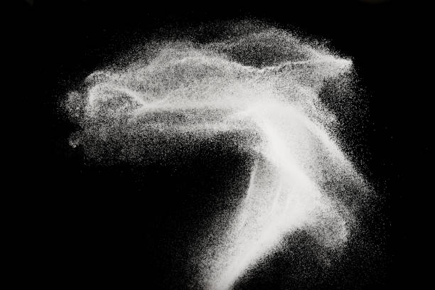 istock Fine sea salt splash explosion on black background ,stop motion food object design 1154776538