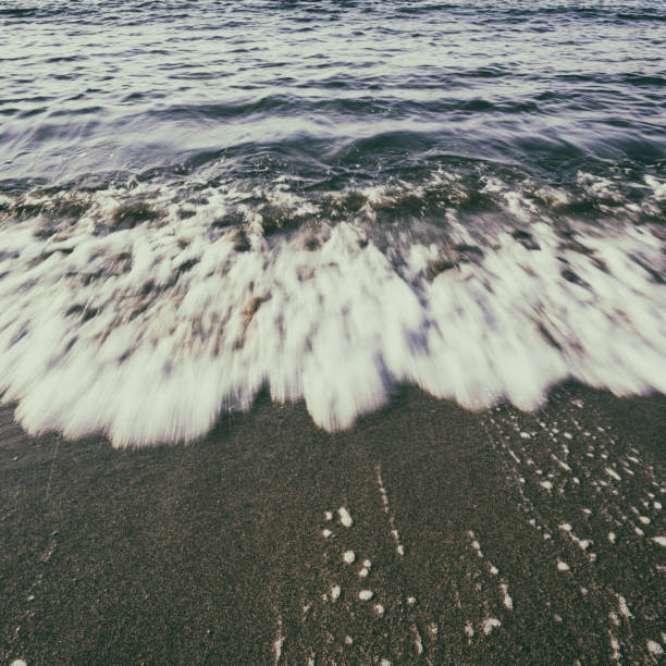 istock Sand beach and ocean or sea wave, nature background 1154781093