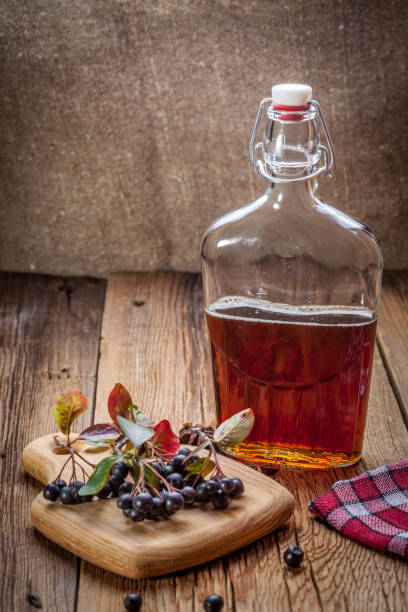 istock Fruits of black chokeberry prepared for processing. 1154781121