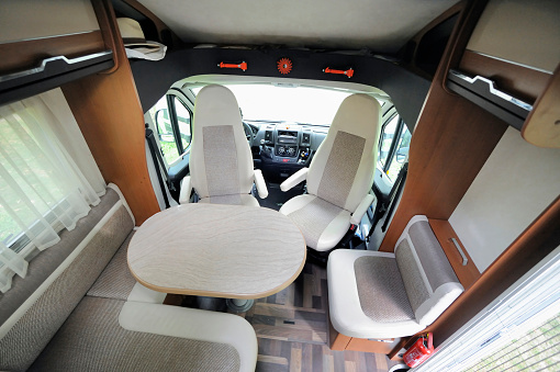 Camper Cabin Interior With Rotating Seats in Recreation Vehicle