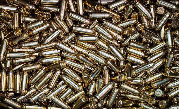 istock Background from 9 mm shiny rounds 1154792346