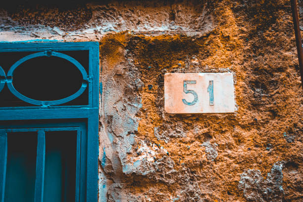 istock number 51 sign on orange background 1154792438