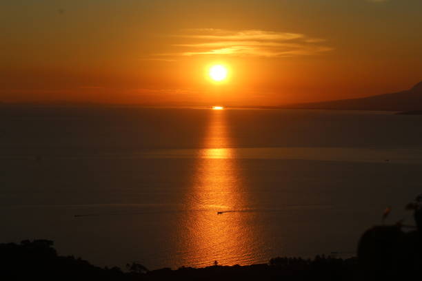 istock Colourful sunset at the ocean 1154793939