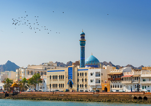 Oman - Muskat, Masjid Al Rasool Al A`dham Mosque. The striking Blue Mosque is the center of the port area of Muscat. It is located on the main road that runs through all of Muscat and is an eye-catcher along the promenade.