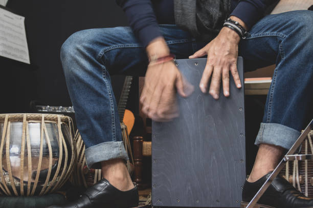 istock A musician playing Cajon drums. 1154794541