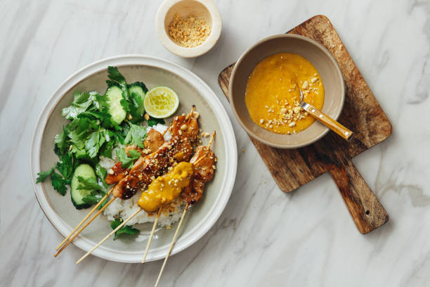 istock Thai chicken satay with peanut sauce 1154797658