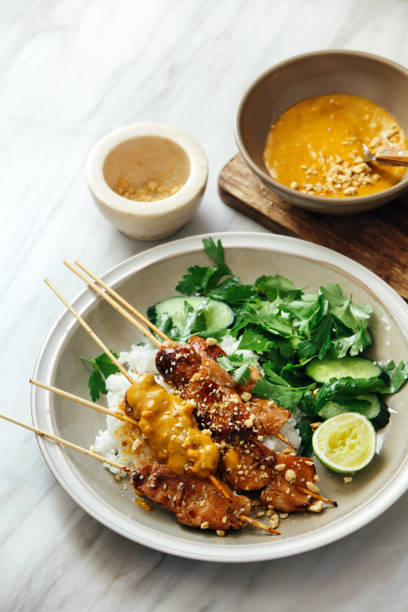 istock Thai chicken satay with peanut sauce 1154797679