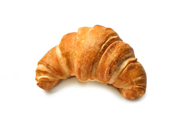 istock Croissant cut out on white background 1154798612