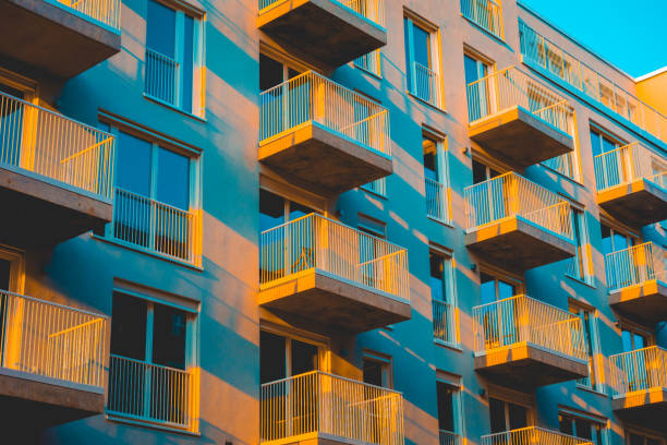 istock beautiful modern building with square balcony in the eve sun 1154799801