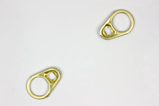 istock Top view of aluminum ring pull on white paper Background. 1154799852