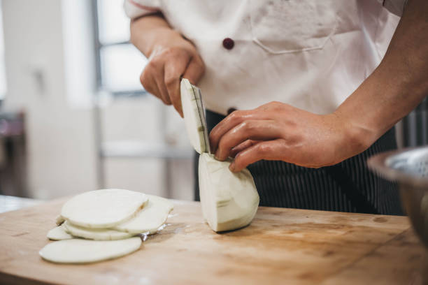 istock Chef preparing vegetable food in Asian restaurant 1154799874