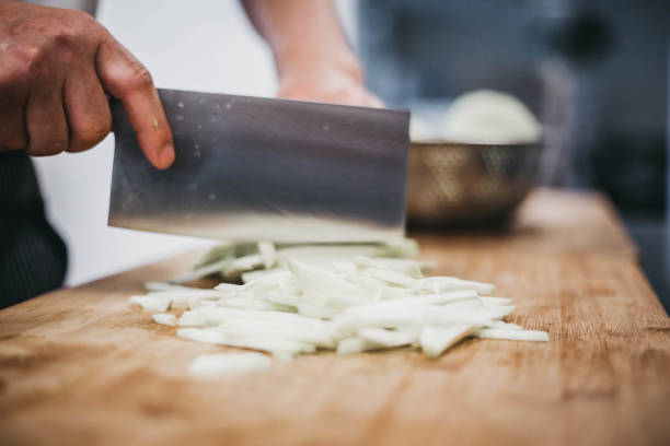istock Chef preparing vegetable food in Asian restaurant 1154801112